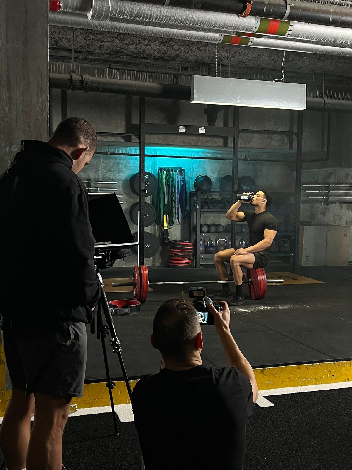 Jeffrey on set at a gym photoshoot